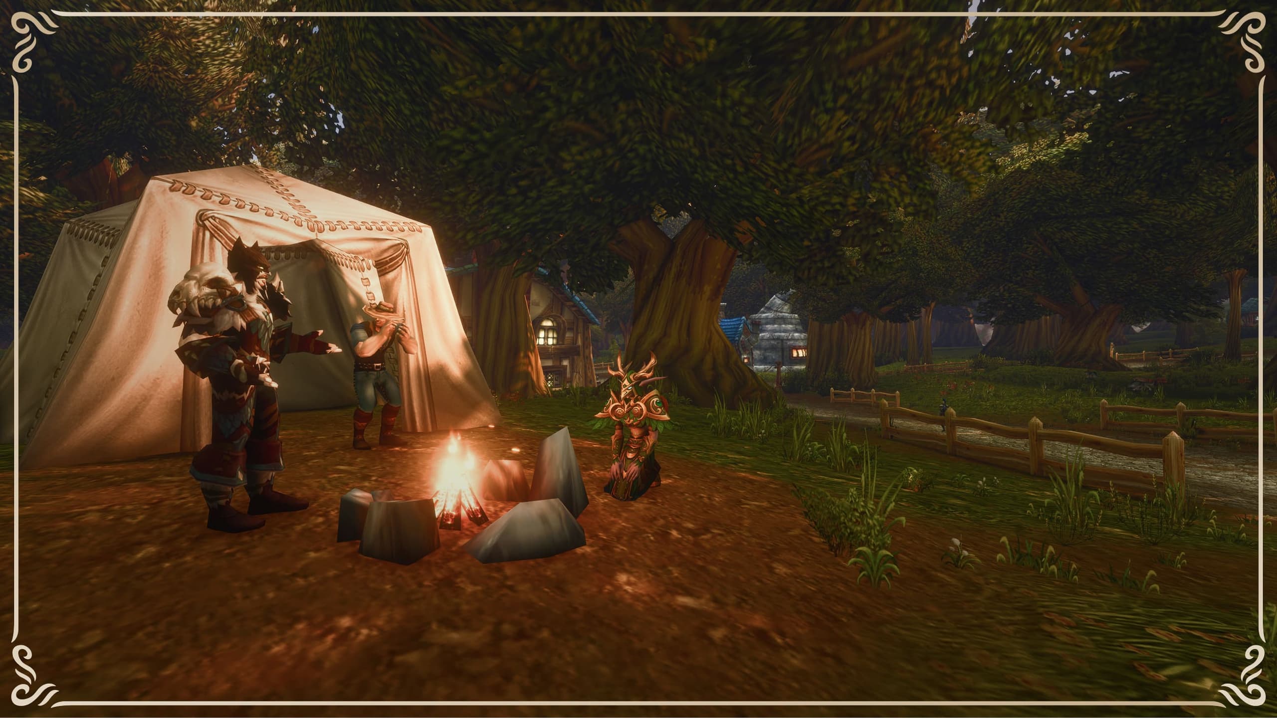 A campfire and tent at the edge of a forest